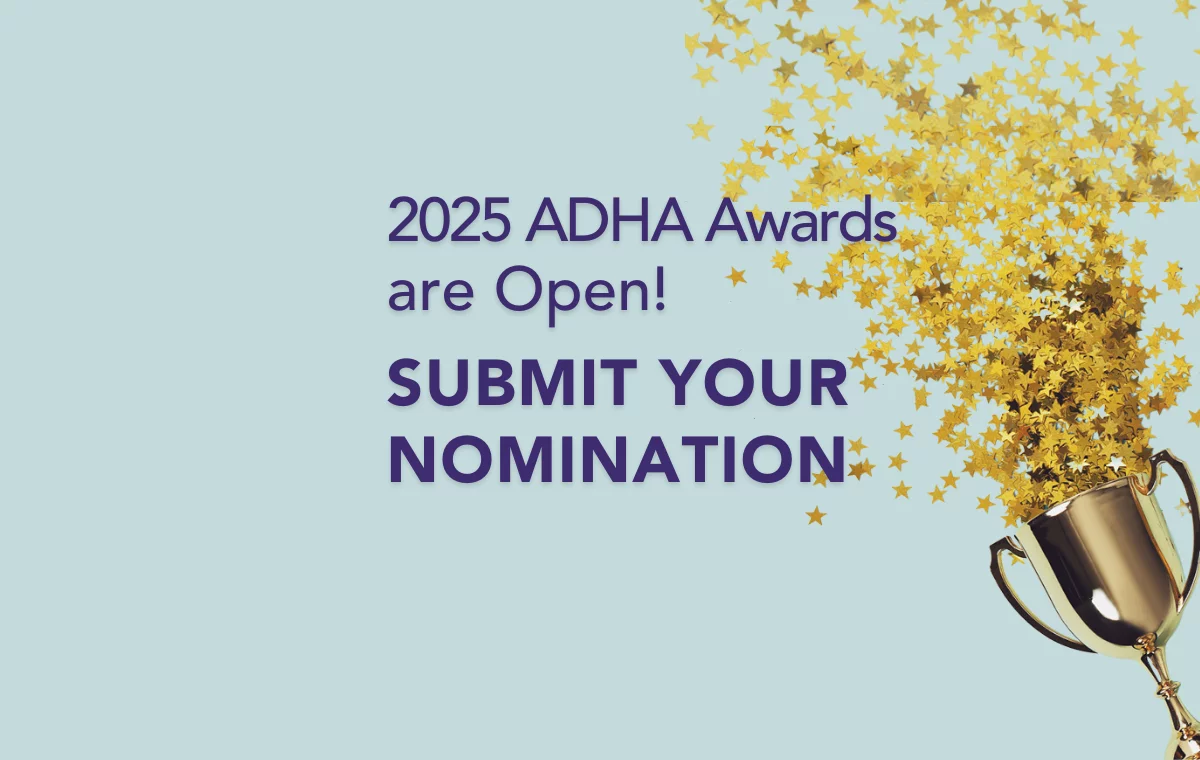 2025 ADHA Awards with trophy